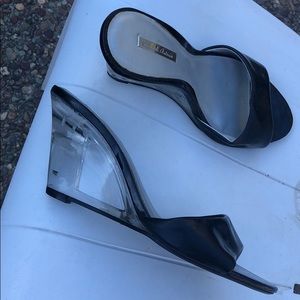 Black wedges with clear wedge heels. Women’s size 6